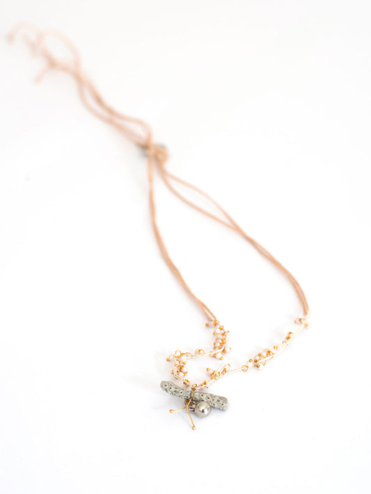 Coral and string necklace