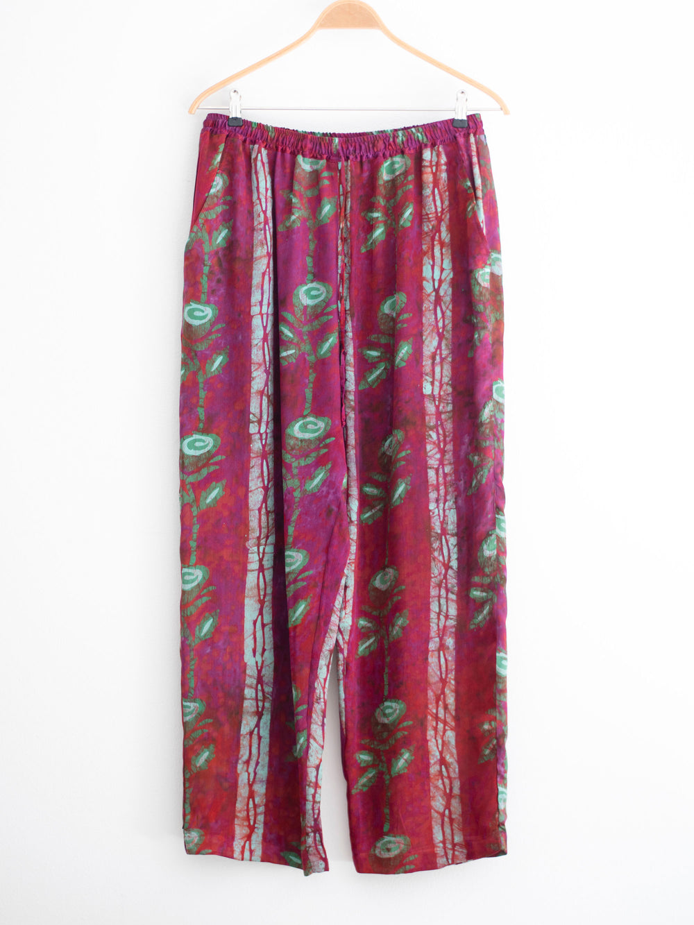 Hand printed silk trousers with large roses