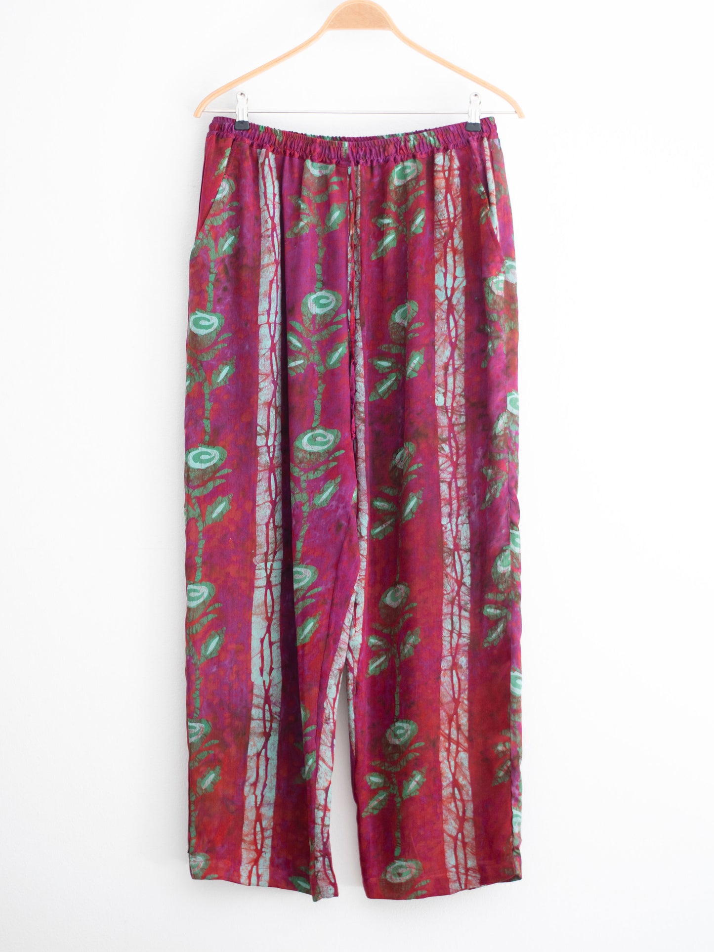 Hand printed silk trousers with large roses