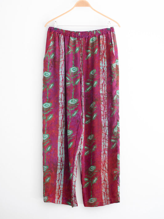 Hand printed silk trousers with large roses