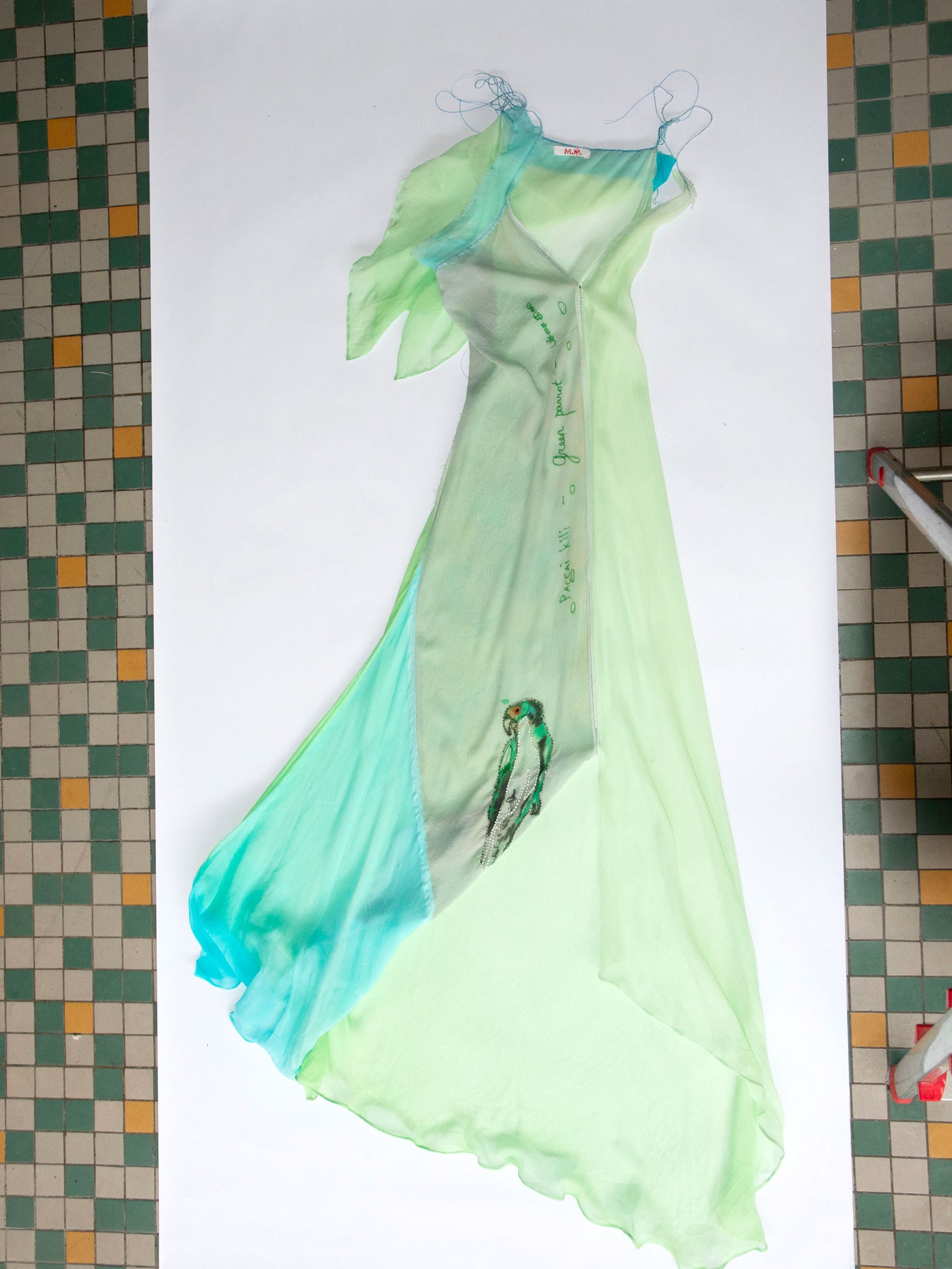 Green parrot draped dress