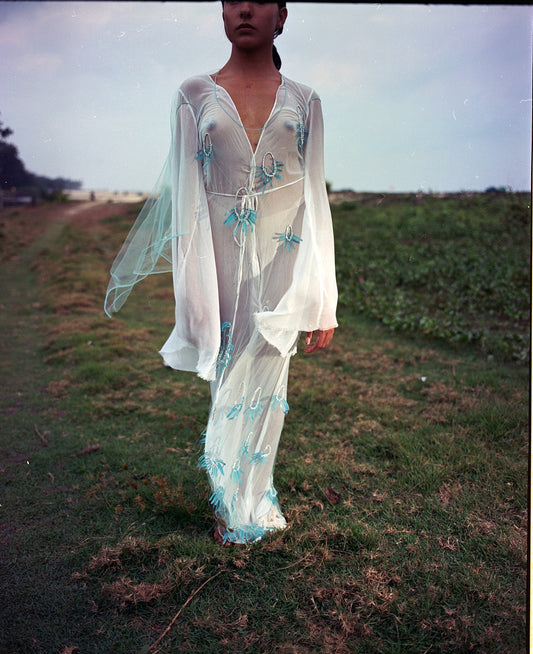 Blue mosquito net dress with reflective flower embroidery